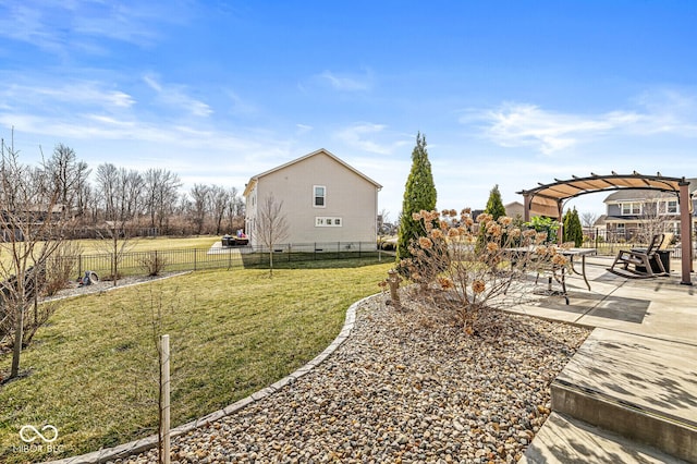 view of yard with a patio area, a fenced backyard, and a pergola