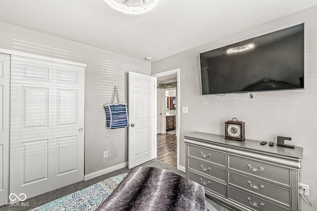 bedroom featuring baseboards