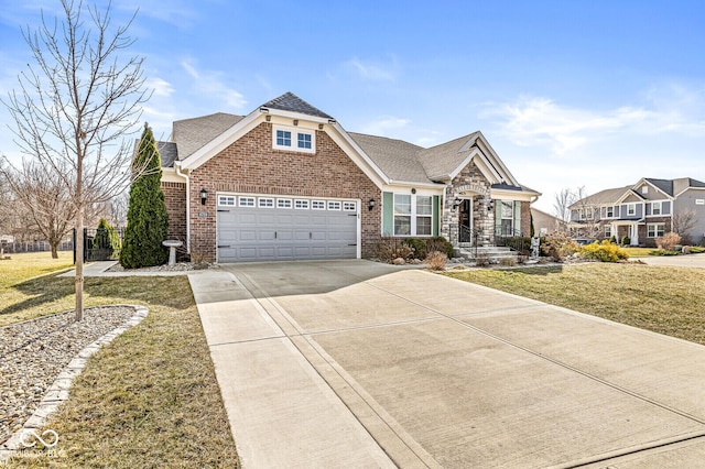 view of front facade with a front yard, an attached garage, a shingled roof, concrete driveway, and brick siding