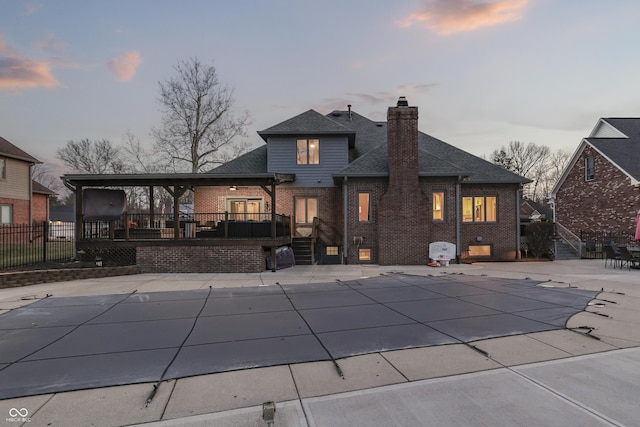 view of pool with a patio area, a fenced in pool, a deck, and fence