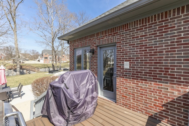 wooden deck with area for grilling