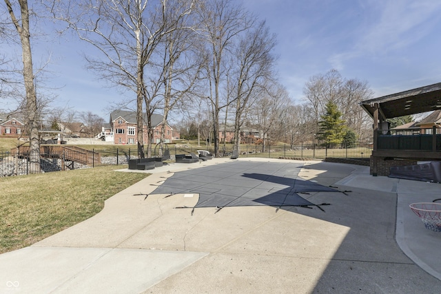 view of pool featuring a patio area, a fenced backyard, and a yard