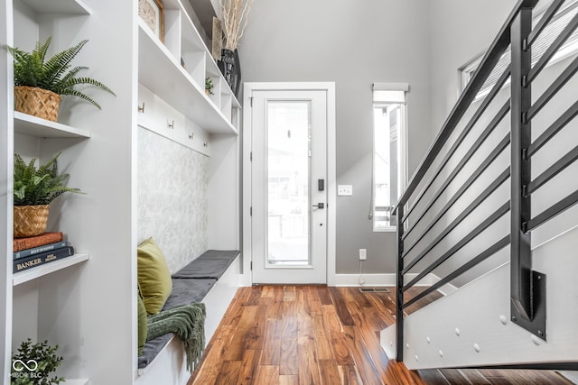 mudroom with wood finished floors