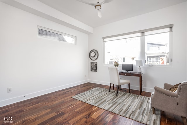 office space with a wealth of natural light, baseboards, and wood finished floors