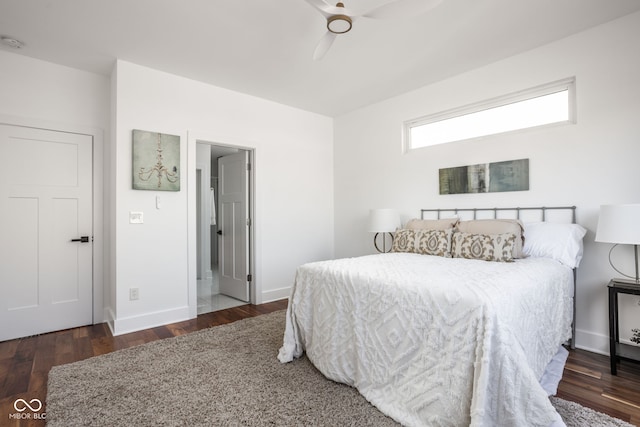 bedroom with a ceiling fan, baseboards, and wood finished floors