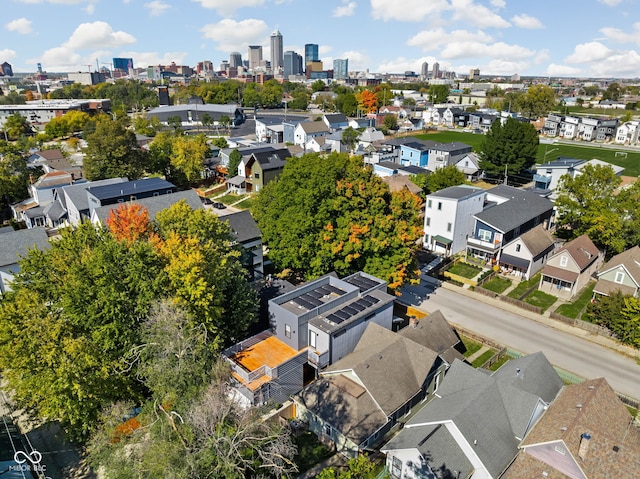 birds eye view of property with a view of city and a residential view