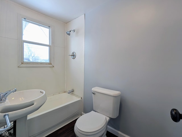 full bathroom featuring toilet and shower / bath combination