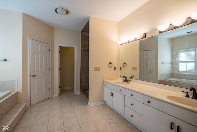 full bath with a sink, a garden tub, double vanity, and a tile shower