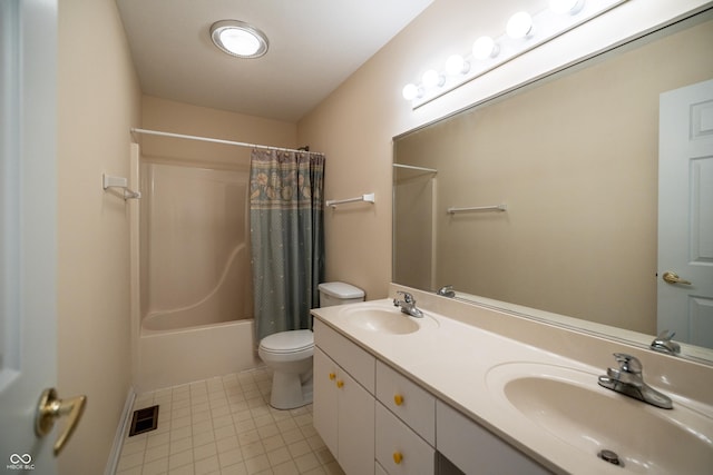 full bath with double vanity, toilet, visible vents, and a sink