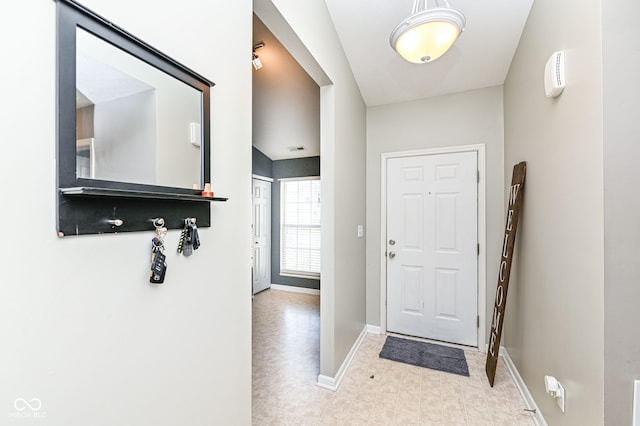 entryway featuring visible vents and baseboards