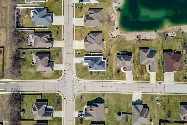 birds eye view of property with a residential view