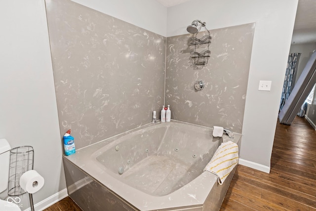 full bath with baseboards and wood-type flooring