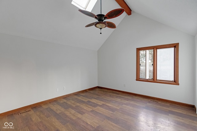 additional living space with lofted ceiling with skylight, visible vents, and wood finished floors