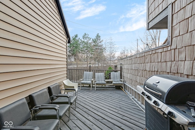 deck featuring a grill