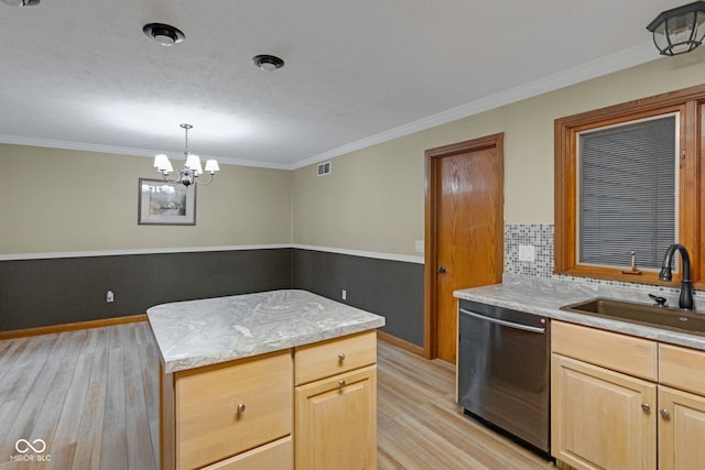 kitchen featuring light brown cabinets, visible vents, dishwasher, and a sink