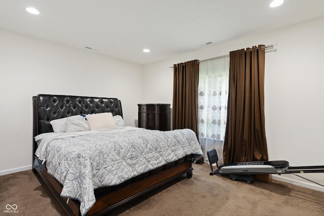 bedroom featuring recessed lighting, visible vents, baseboards, and carpet