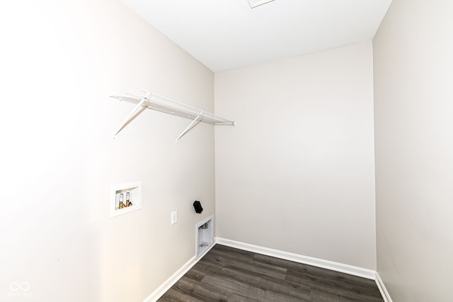 laundry area with laundry area, hookup for a washing machine, dark wood-type flooring, and baseboards