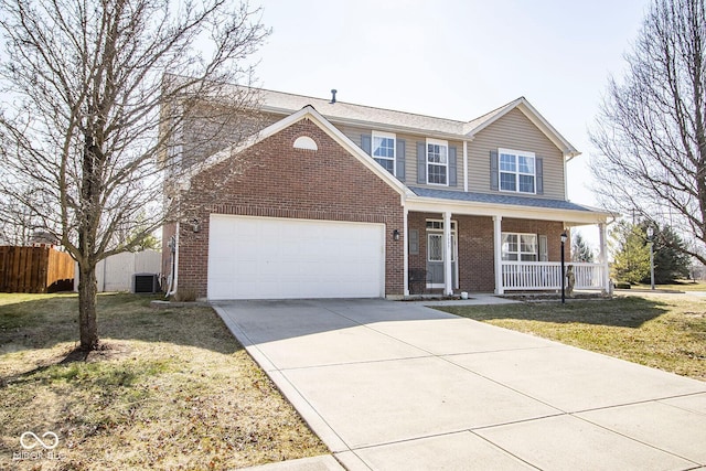 traditional-style home featuring central air condition unit, fence, concrete driveway, an attached garage, and brick siding