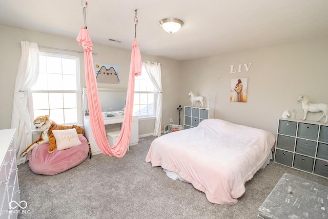 carpeted bedroom with visible vents