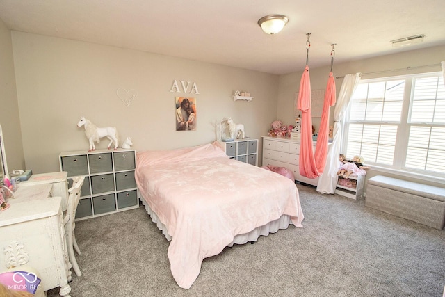 bedroom featuring visible vents and carpet floors