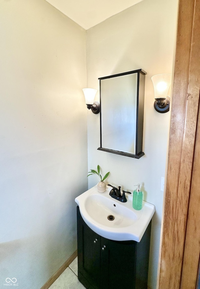 bathroom featuring vanity and baseboards