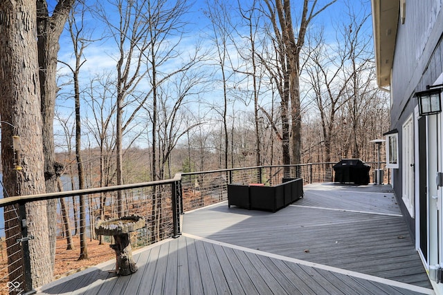 wooden terrace with grilling area