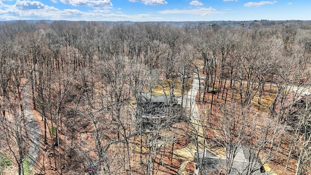 aerial view featuring a view of trees