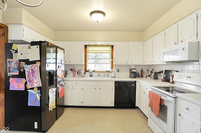 kitchen with a sink, white appliances, tasteful backsplash, and white cabinets