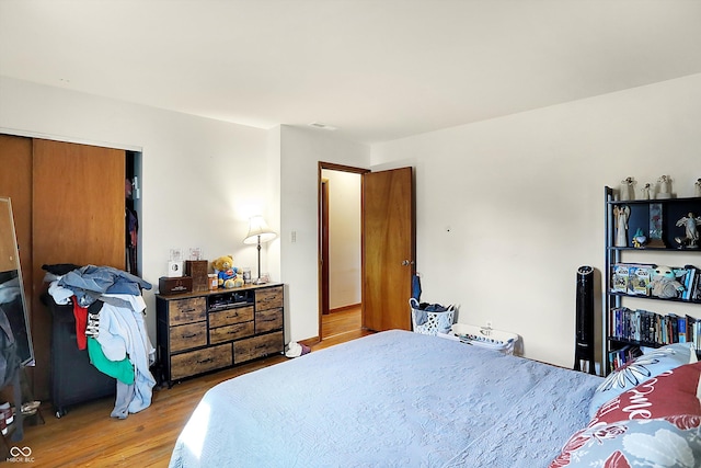 bedroom featuring visible vents and light wood-type flooring