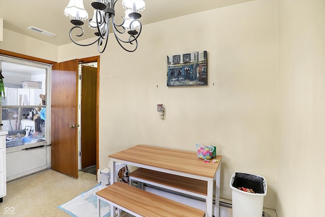 dining area with an inviting chandelier and visible vents