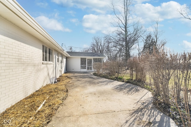 view of patio / terrace with driveway