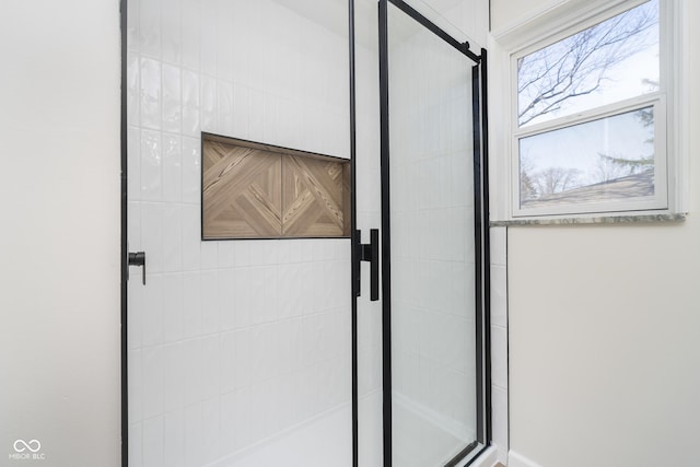 bathroom featuring a stall shower