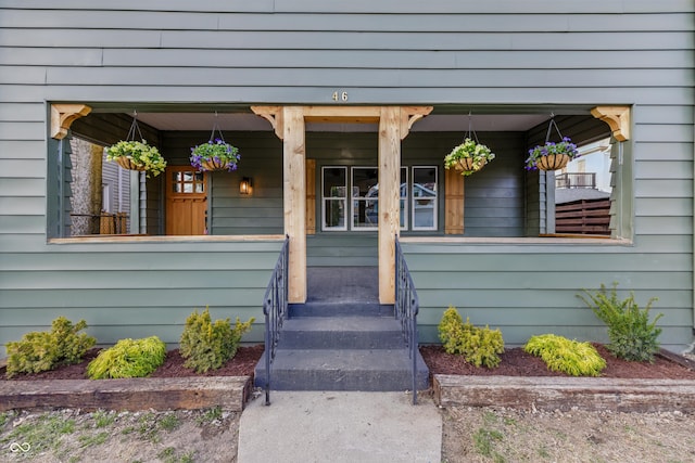 doorway to property with a porch