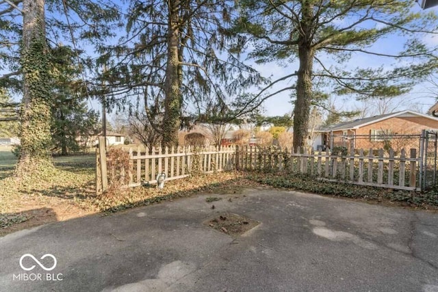 2447 N E Raintree Dr, New Castle, IN 47362 - gate featuring a patio area