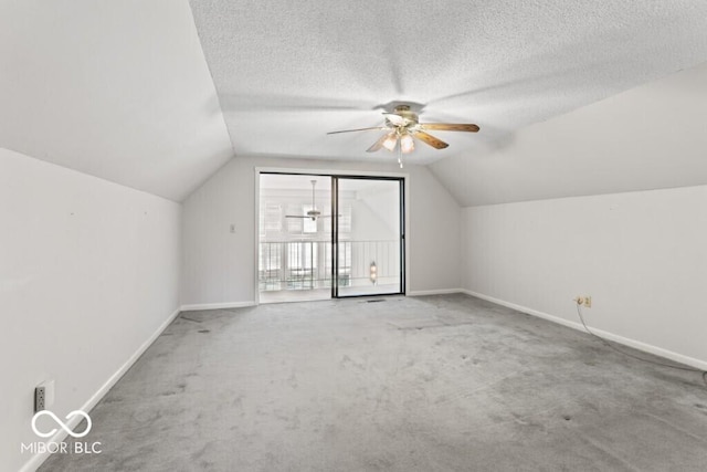 2447 N E Raintree Dr, New Castle, IN 47362 - additional living space featuring carpet, lofted ceiling, ceiling fan, and a textured ceiling