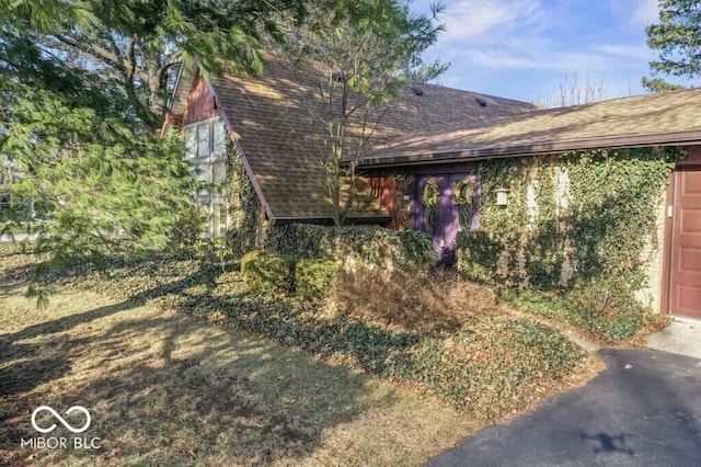 2447 N E Raintree Dr, New Castle, IN 47362 - view of home's exterior featuring roof with shingles