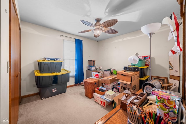 storage area featuring ceiling fan