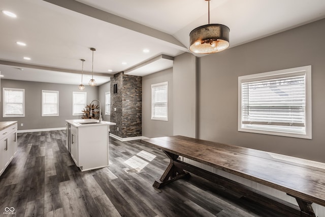 dining space featuring recessed lighting, baseboards, and dark wood-style floors