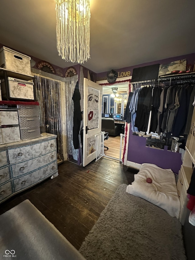 bedroom with wood finished floors