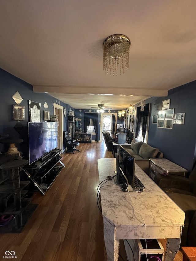 living room with a ceiling fan and dark wood-style flooring