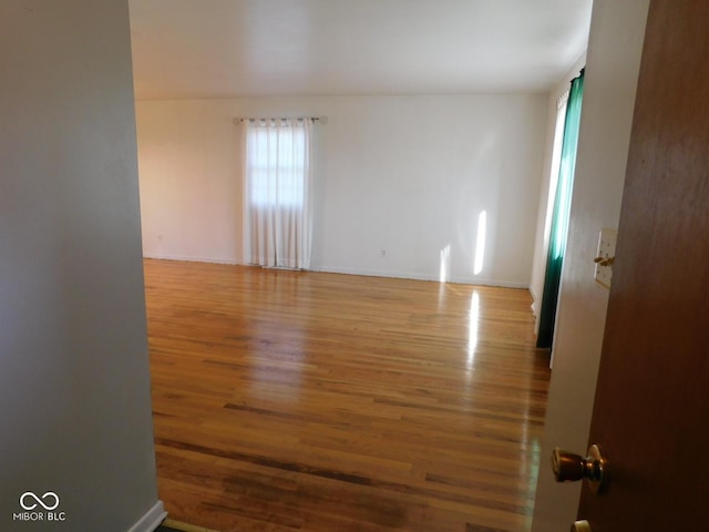 empty room featuring wood finished floors