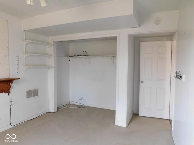 interior space with light colored carpet and visible vents