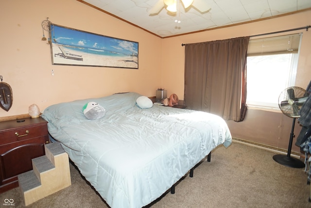 carpeted bedroom featuring ceiling fan and ornamental molding