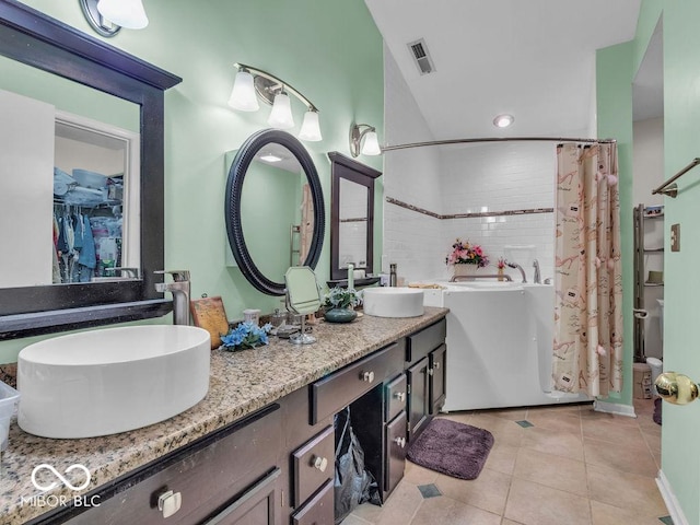 6556 Aintree Ter, Indianapolis, IN 46250 - bathroom with a shower with curtain, a sink, a bath, double vanity, and tile patterned flooring