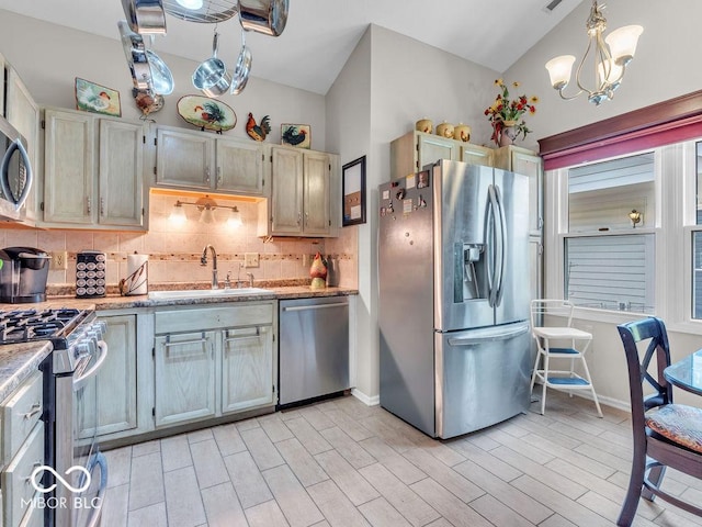 6556 Aintree Ter, Indianapolis, IN 46250 - kitchen with wood finish floors, a sink, backsplash, and stainless steel appliances