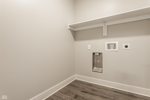 washroom featuring baseboards, dark wood finished floors, laundry area, hookup for a washing machine, and electric dryer hookup