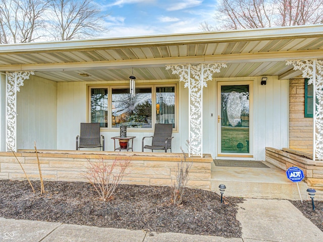 entrance to property with a porch