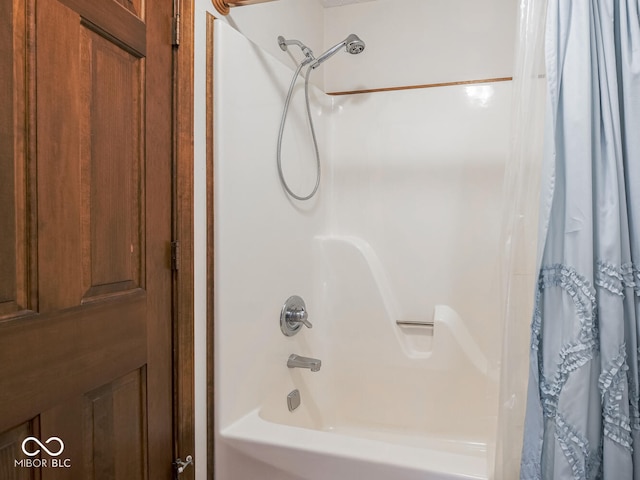 full bathroom featuring shower / tub combo with curtain