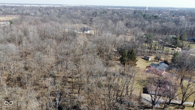 aerial view featuring a forest view