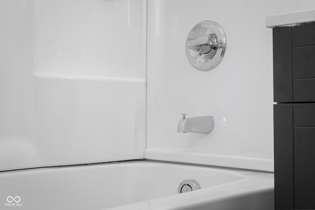 full bathroom with a tub to relax in